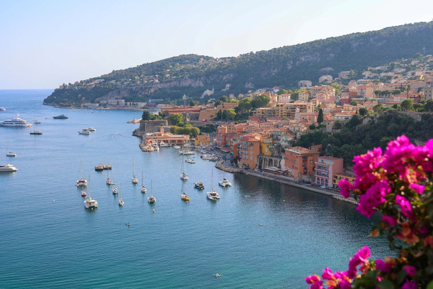 Villefranche Print view of Villefranche-sur-Mer with blooming Bougainvillea and boats in the harbor.