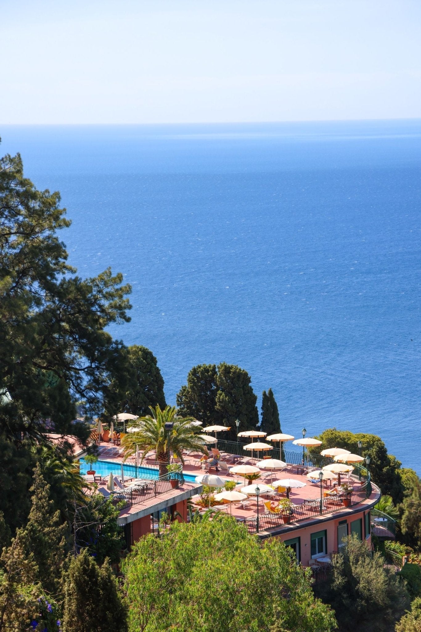 Italy Print of the serene Hotel Villa Diodoro pool and terraces overlooking the Ionian Sea in Taormina.