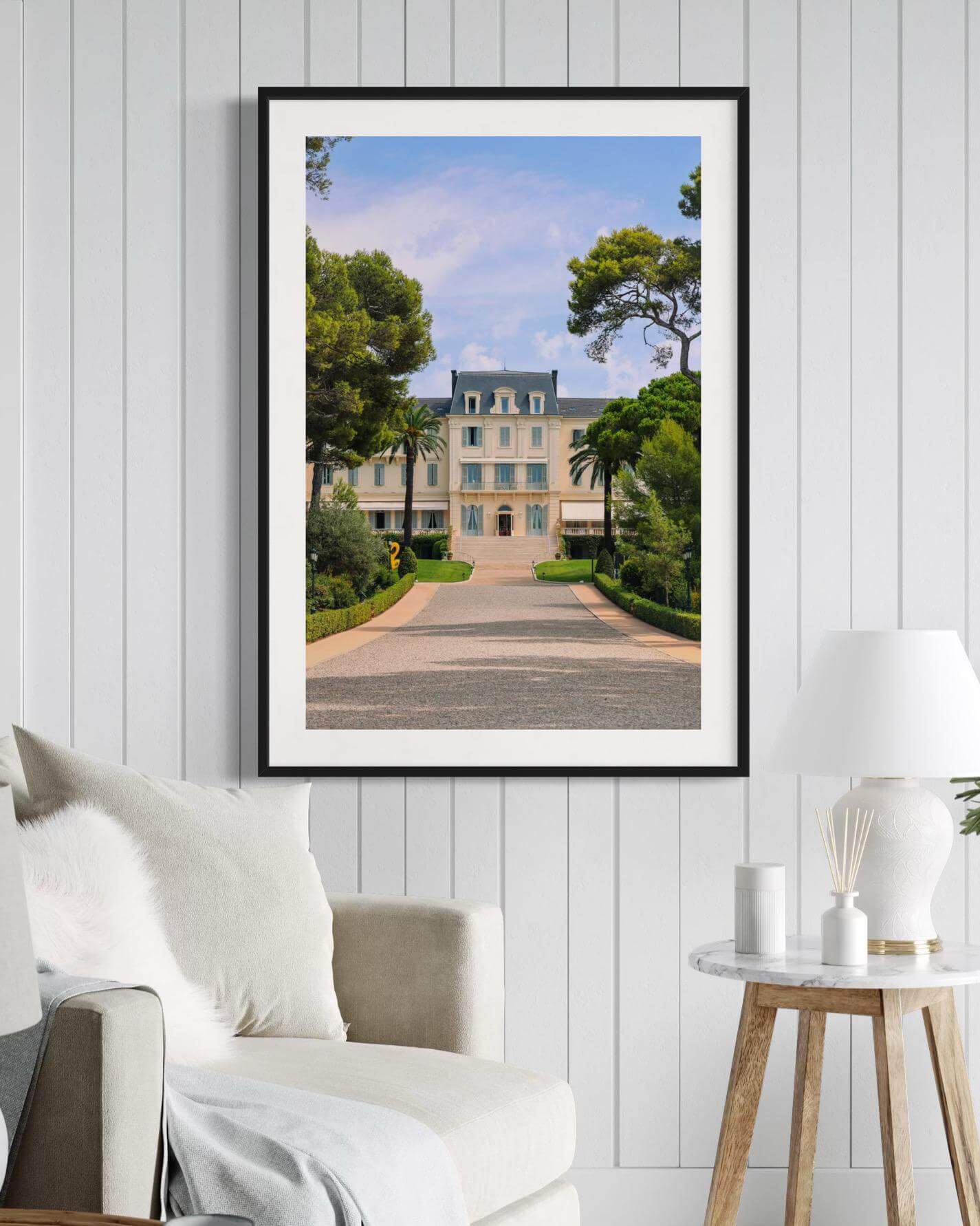 Eden Roc Print of the luxurious Hotel du Cap Eden Roc in Antibes, framed on a modern living room wall.