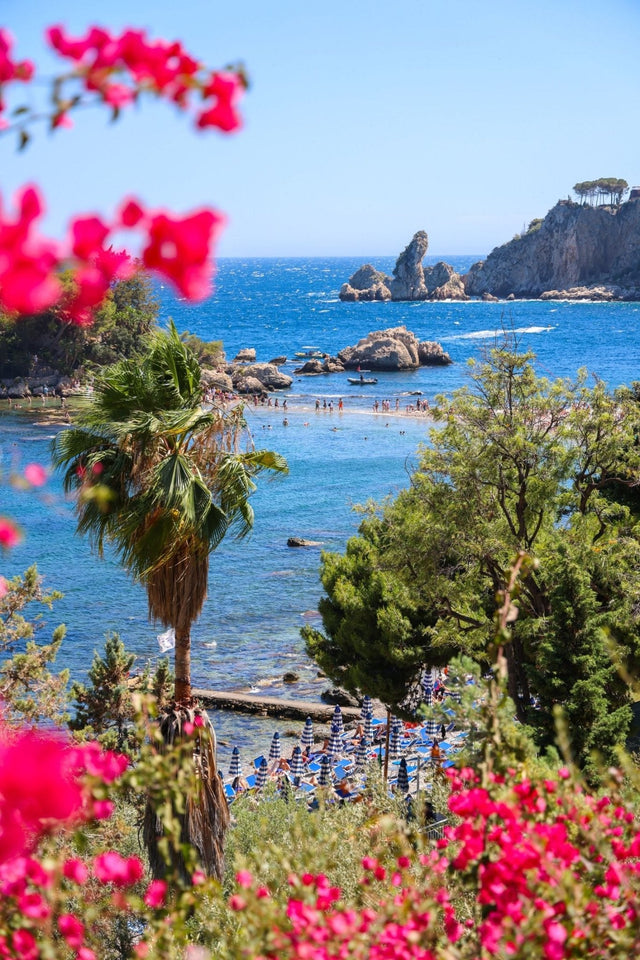 Sicily Print of Isola Bella showing iconic coastal view with flowers and beachgoers.