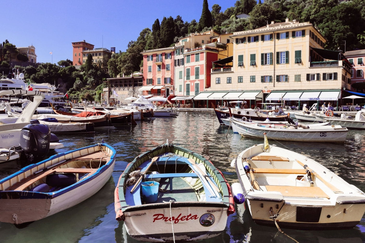 Portofino Boat Print featuring fishing boat Profeta in the scenic harbor of Portofino with colorful buildings.