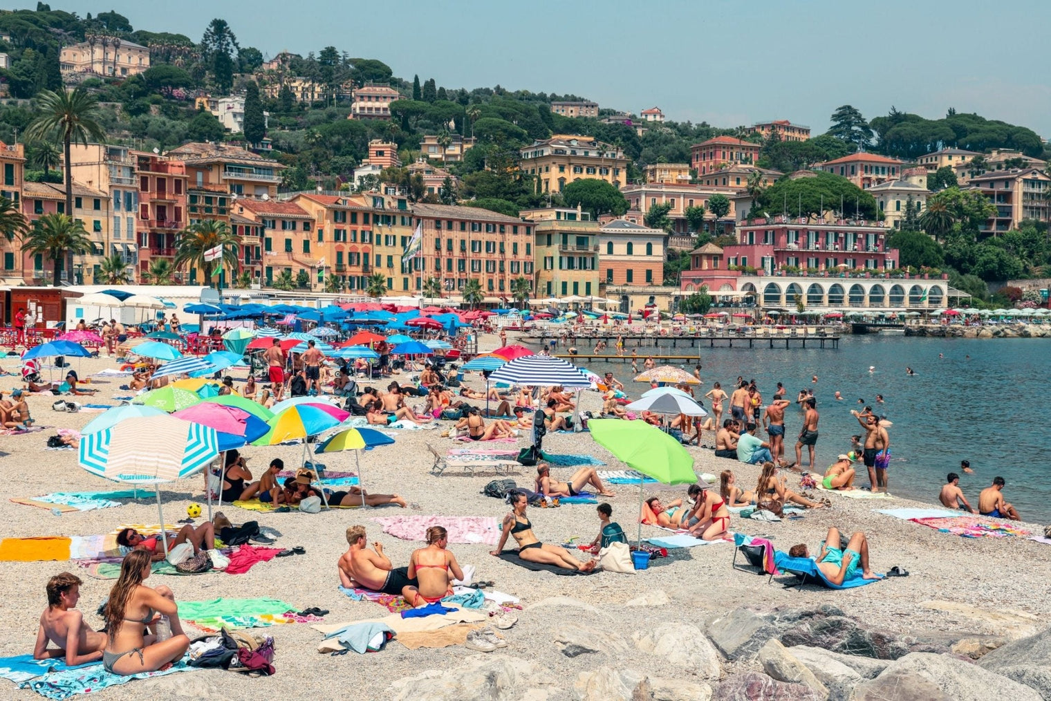 Italy Beach Print featuring a vibrant scene in Santa Margherita Ligure, showcasing sunbathers and colorful umbrellas.