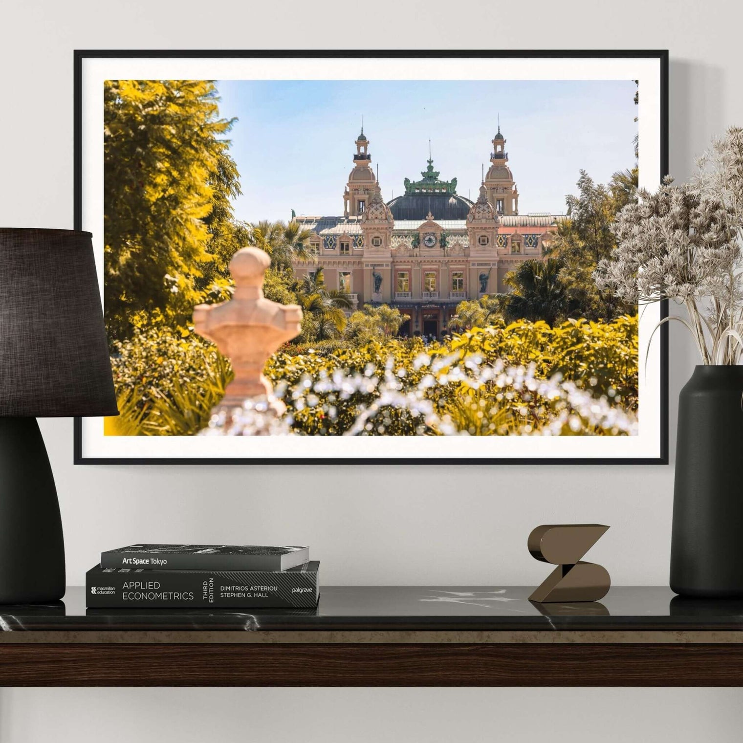 Bust of Prince Charles III overlooking the iconic Monaco Casino Print in Monte Carlo gardens.