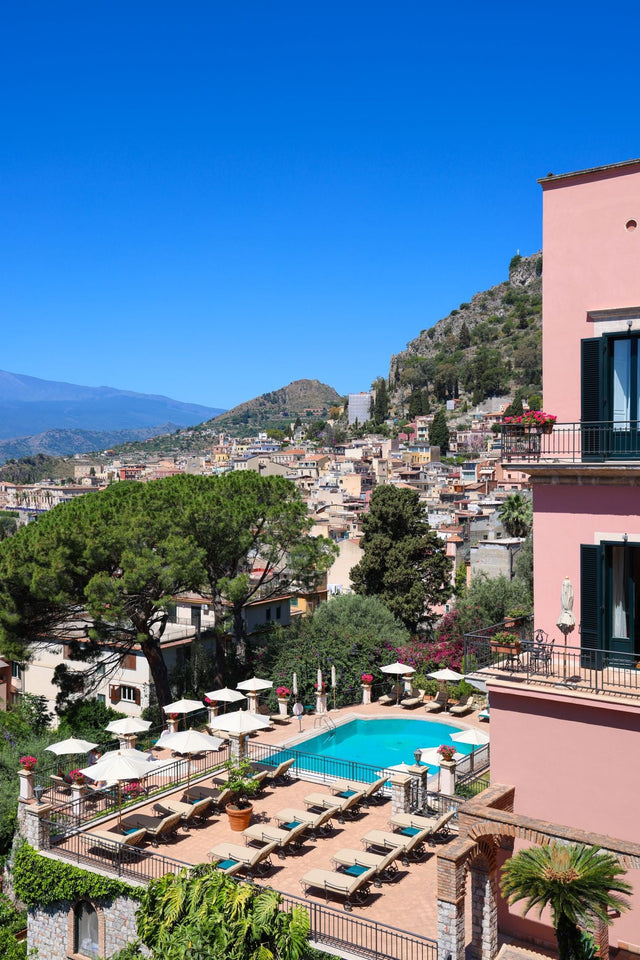 Taormina Print showcasing the terrace pool of Grand Hotel Timeo with stunning views of Taormina's hills and streets.