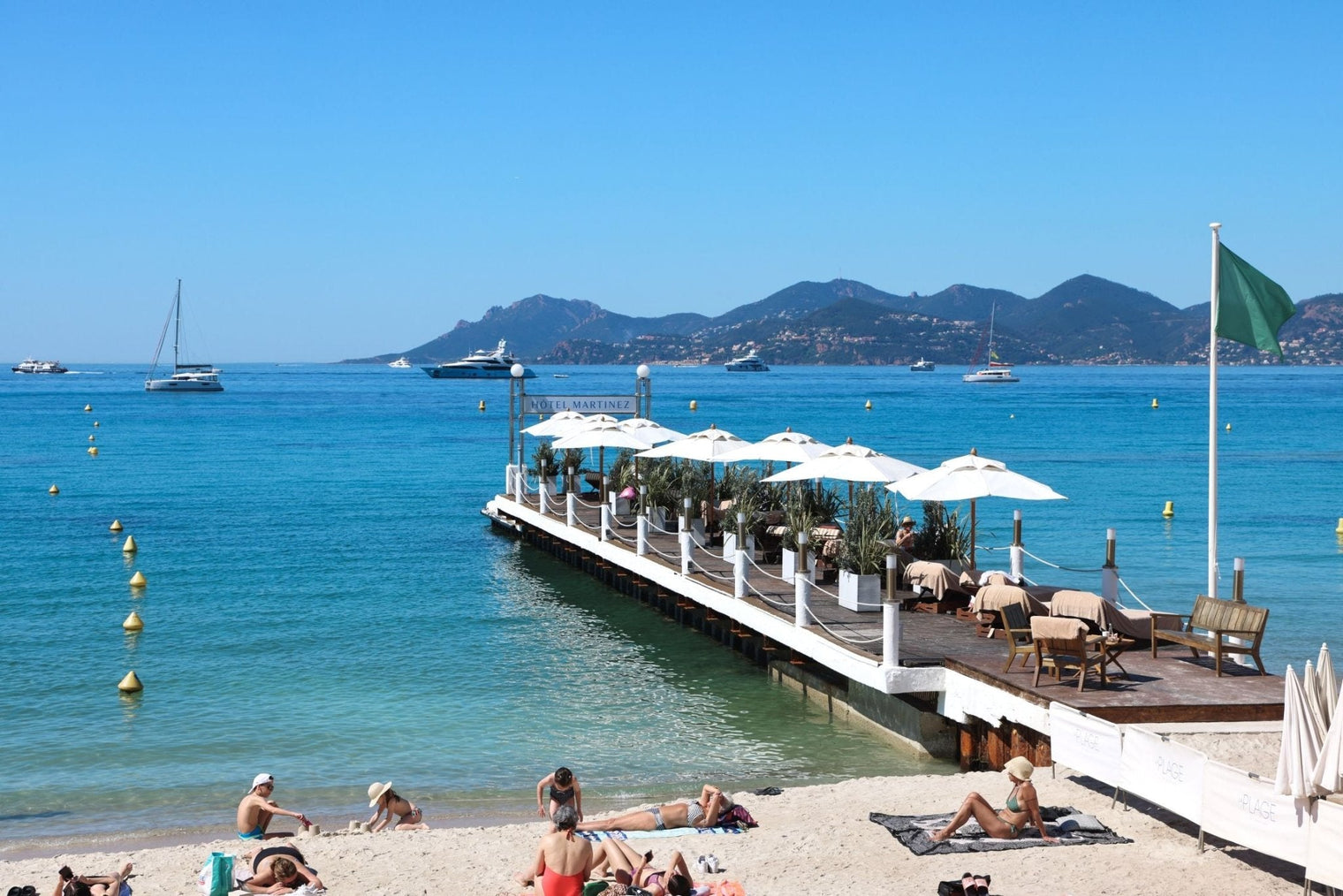 Beautiful view of Plage Martinez Print showcasing the iconic pier and azure Mediterranean, capturing Cannes' chic lifestyle.