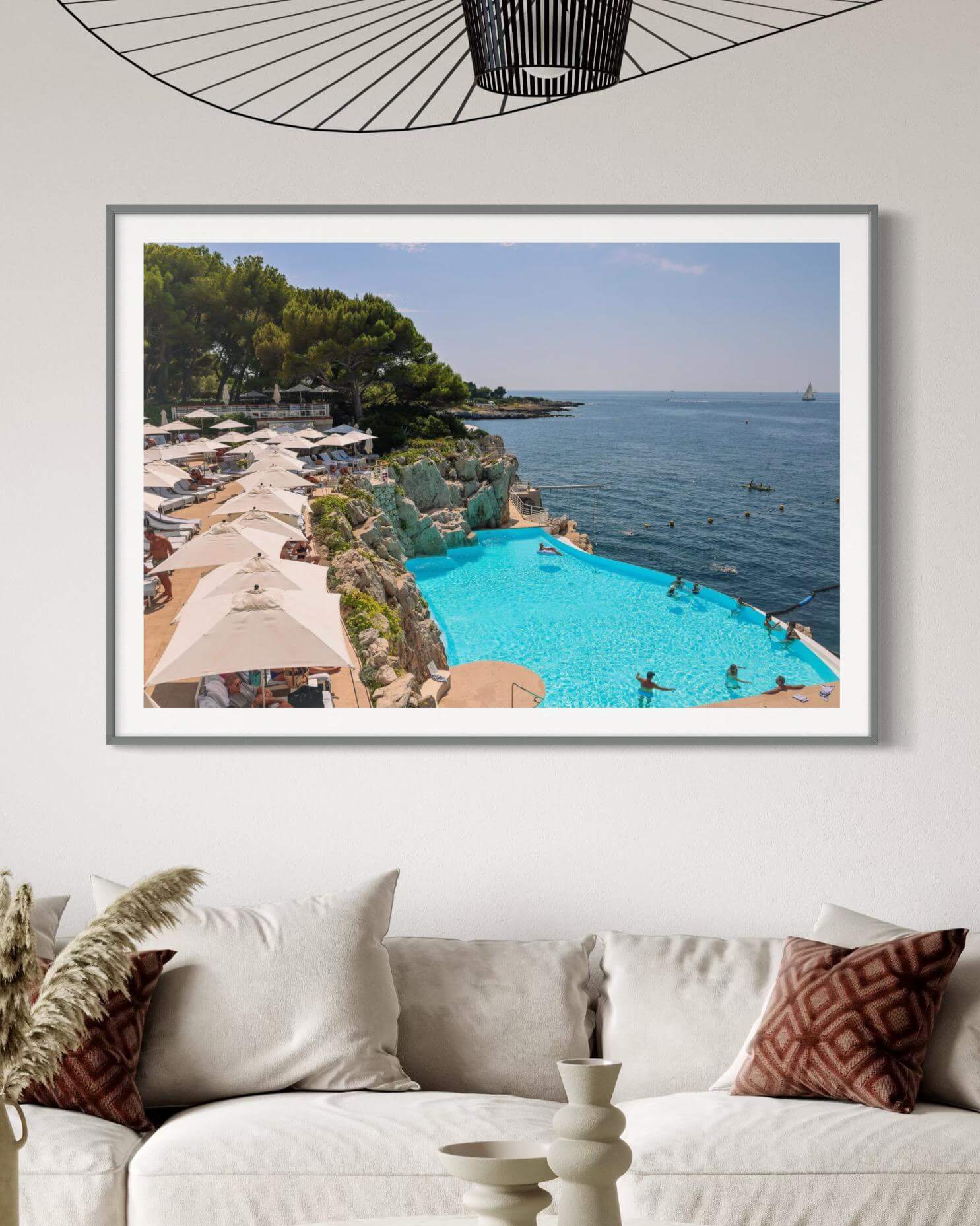 Eden Roc Print of the poolside at the Hotel du Cap Eden Roc, Antibes, with clear blue skies and serene waters.