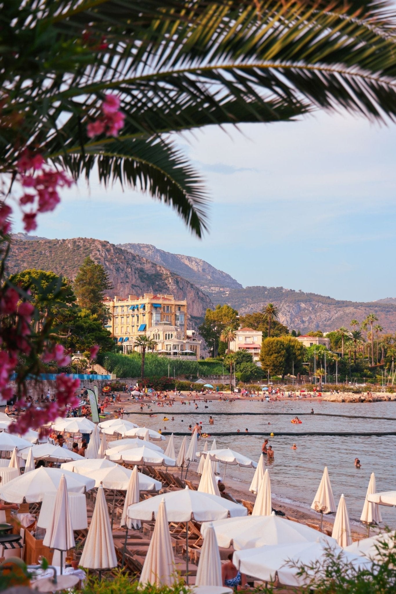 Beaulieu Print showcasing Beaulieu-sur-Mer with palm leaves, vibrant blooms, and elegant villas by the beach.