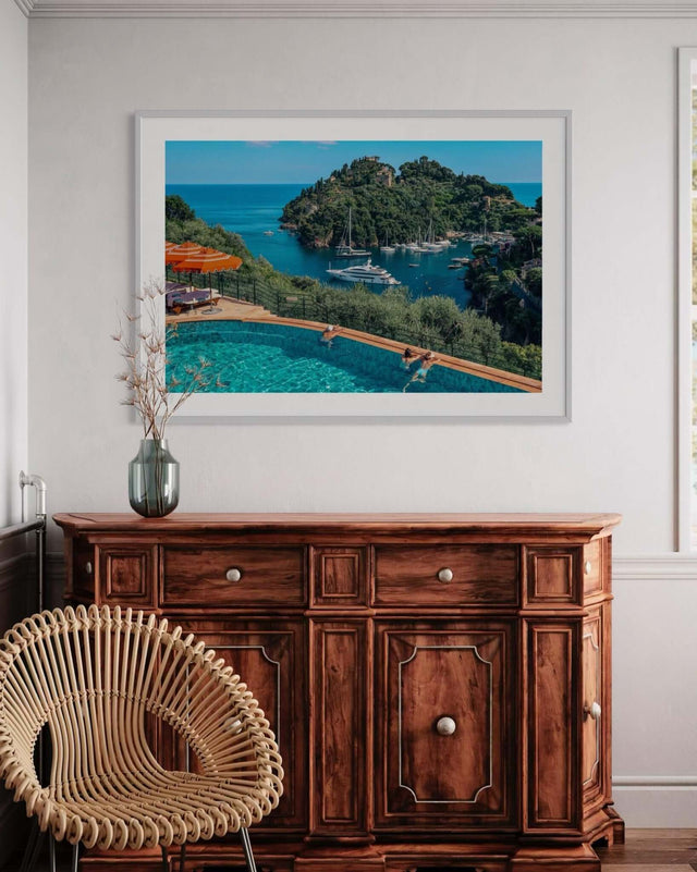 Portofino Print of the bay and anchored superyacht seen from Splendido Hotel in a stylish interior setting.